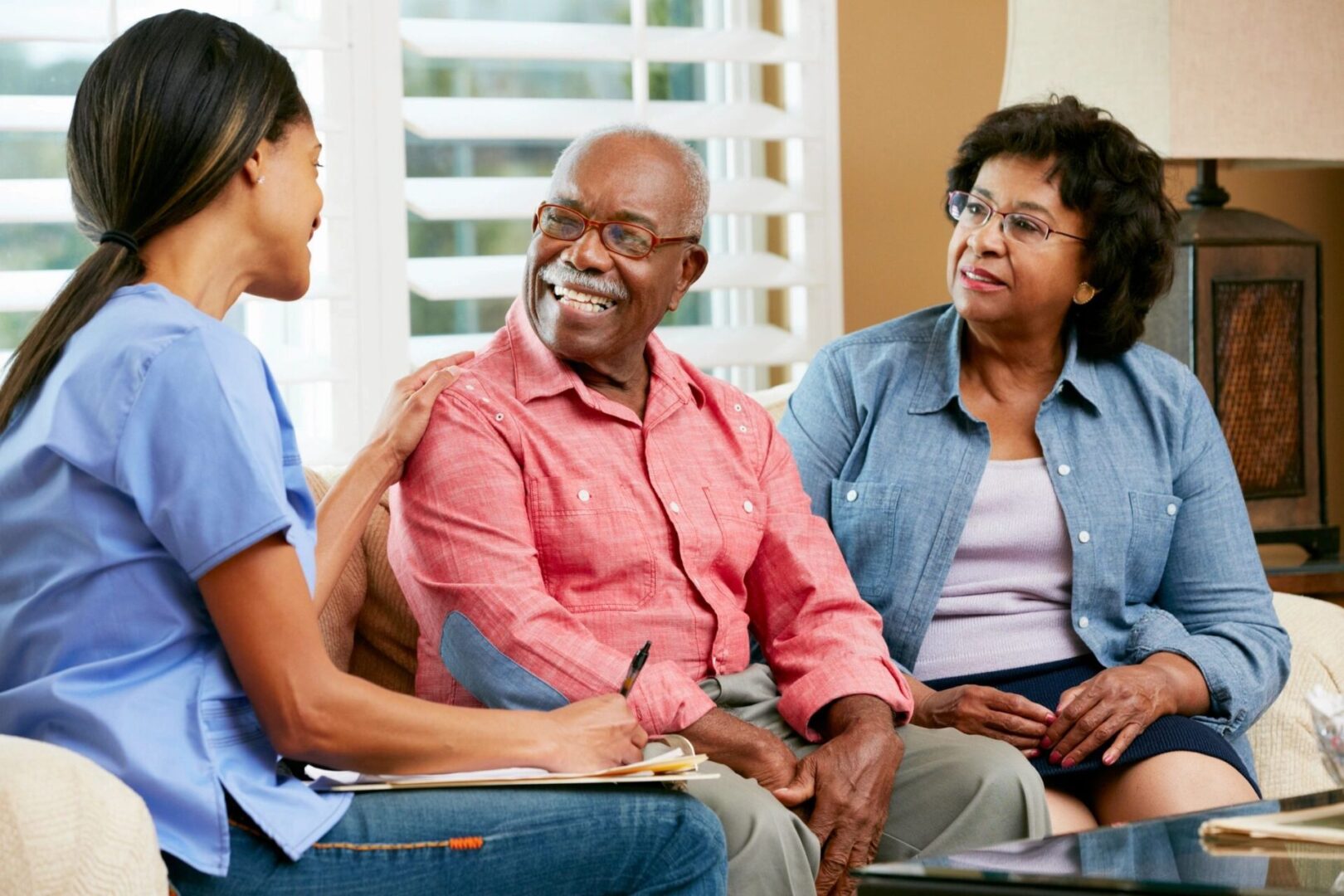 A realtor talking to a woman and a man