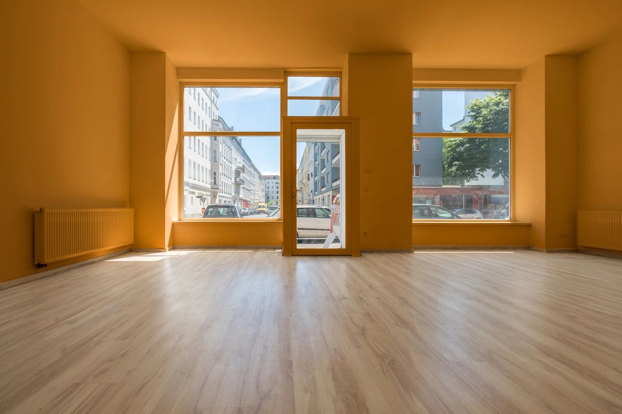 An empty apartment with yellow walls